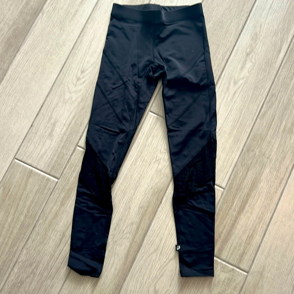 Xs black and sheer leggings.  Mid rise black